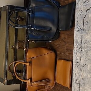 Like new Bass handbags.